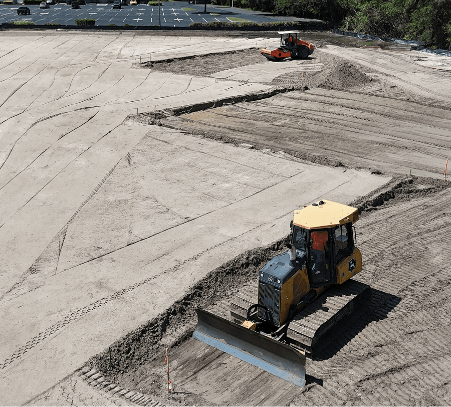 Bulldozer grading large construction site